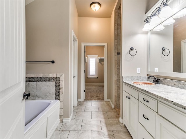 13340 Greenscape Rd, Piedmont, OK 73078 - bathroom featuring a bath, vanity, and baseboards