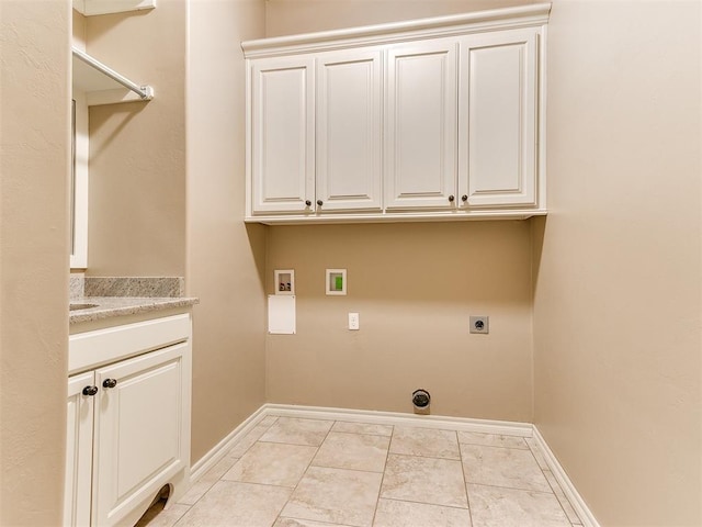 13340 Greenscape Rd, Piedmont, OK 73078 - laundry area featuring washer hookup, baseboards, cabinet space, and electric dryer hookup