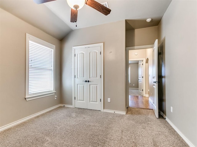 13340 Greenscape Rd, Piedmont, OK 73078 - unfurnished bedroom featuring baseboards, a closet, vaulted ceiling, carpet floors, and visible vents