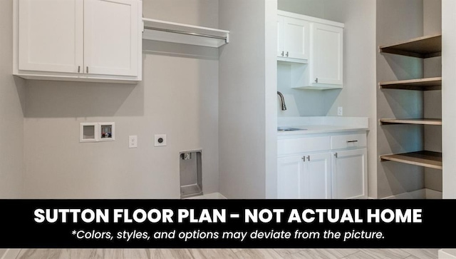 10000 Calypso Way, Yukon, OK 73099 - washroom with washer hookup, cabinet space, and electric dryer hookup
