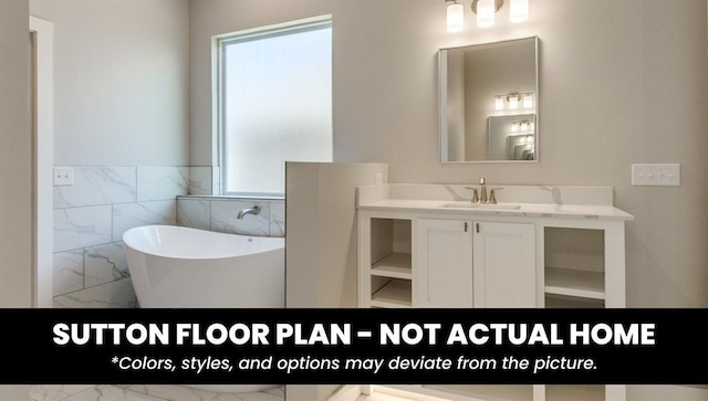 10000 Calypso Way, Yukon, OK 73099 - full bathroom featuring a freestanding bath, marble look tile flooring, plenty of natural light, tile walls, and vanity