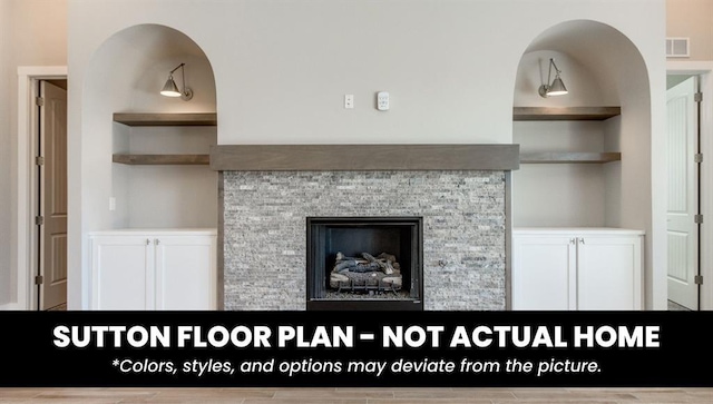 10000 Calypso Way, Yukon, OK 73099 - detailed view of built in shelves and a fireplace