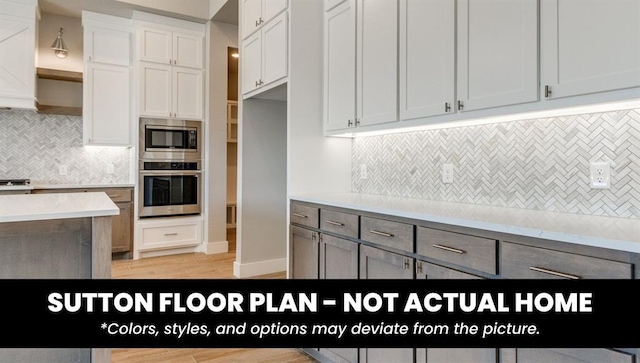 10000 Calypso Way, Yukon, OK 73099 - kitchen with stainless steel appliances, open shelves, decorative backsplash, light countertops, and light wood finished floors