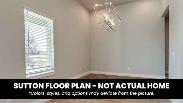10000 Calypso Way, Yukon, OK 73099 - spare room featuring a chandelier and wood finished floors