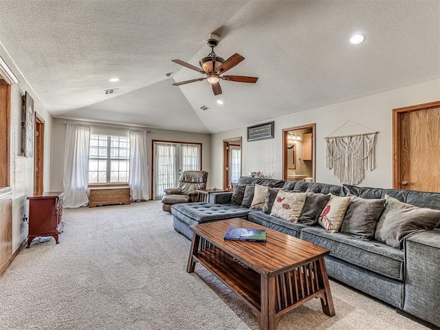 933 Luglena Ln, Purcell, OK 73080 - living room featuring a textured ceiling, light carpet, lofted ceiling, ceiling fan, and recessed lighting