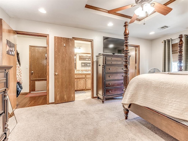 933 Luglena Ln, Purcell, OK 73080 - bedroom featuring ensuite bath, light colored carpet, recessed lighting, and ceiling fan