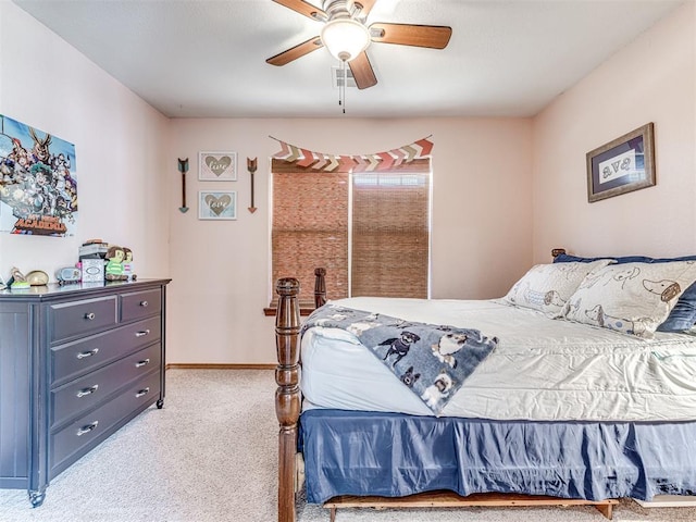 933 Luglena Ln, Purcell, OK 73080 - bedroom with carpet floors, baseboards, and a ceiling fan