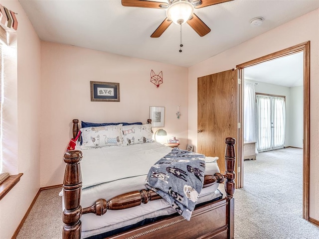 933 Luglena Ln, Purcell, OK 73080 - carpeted bedroom with baseboards and ceiling fan