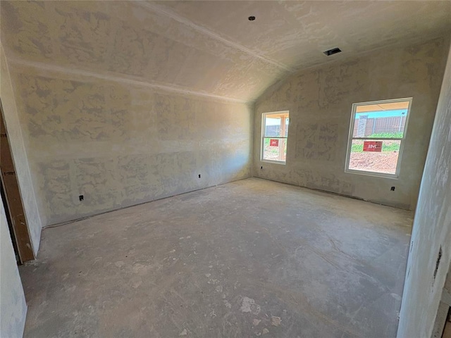 2333 SE 89th Ter, Oklahoma City, OK 73160 - unfurnished room featuring lofted ceiling and concrete flooring