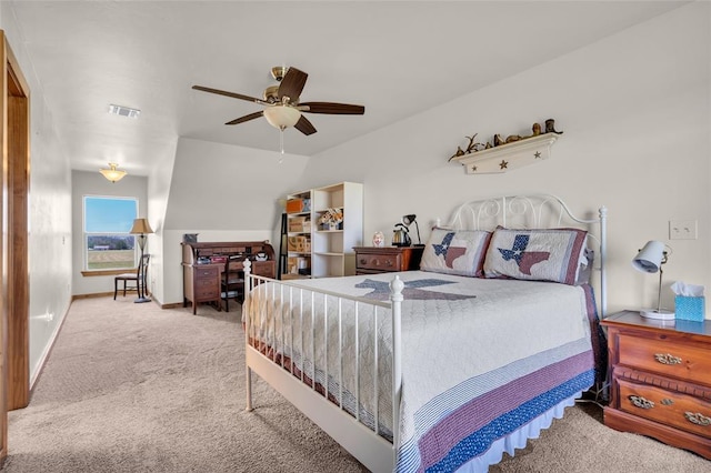 bedroom with carpet floors, baseboards, a ceiling fan, and visible vents