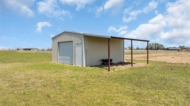 view of outbuilding featuring fence and an outdoor structure