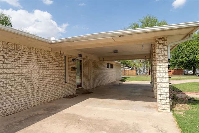 515 W Tennessee Ave, Pauls Valley, OK 73075 - view of patio / terrace featuring a carport and driveway