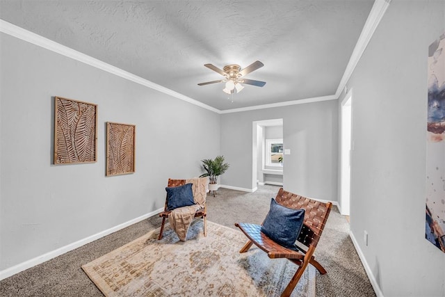 2736 Pembroke Ter, Oklahoma City, OK 73116 - sitting room with ornamental molding, baseboards, carpet, and ceiling fan