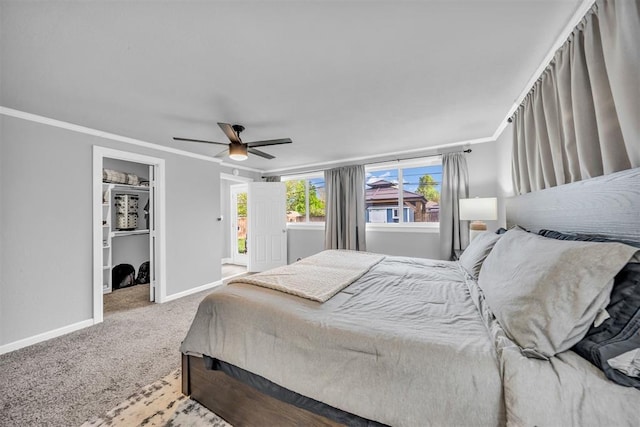 2736 Pembroke Ter, Oklahoma City, OK 73116 - bedroom featuring a ceiling fan, baseboards, crown molding, and carpet