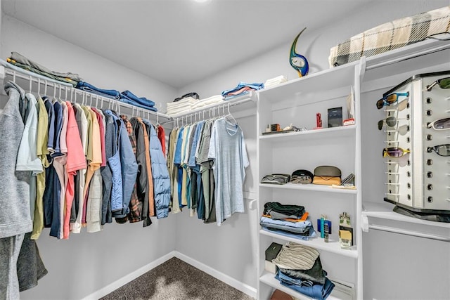 2736 Pembroke Ter, Oklahoma City, OK 73116 - walk in closet featuring carpet floors