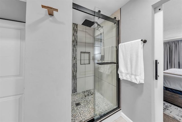 2736 Pembroke Ter, Oklahoma City, OK 73116 - ensuite bathroom with ensuite bathroom, baseboards, and a shower stall