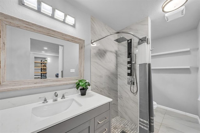 2736 Pembroke Ter, Oklahoma City, OK 73116 - bathroom featuring a shower stall, marble finish floor, toilet, and vanity