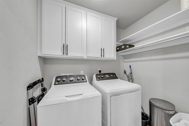 2736 Pembroke Ter, Oklahoma City, OK 73116 - laundry room with washing machine and dryer and cabinet space