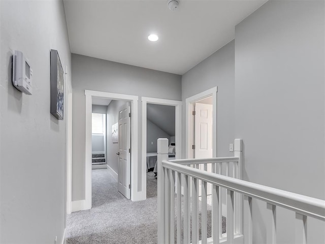 1629 N Klein Ave, Oklahoma City, OK 73106 - hall with carpet, baseboards, and an upstairs landing