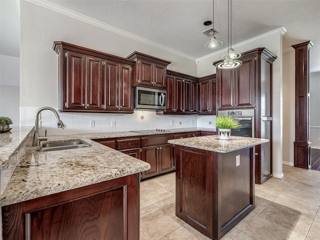 kitchen featuring crown molding, light stone counters, hanging light fixtures, a sink, and stainless steel appliances