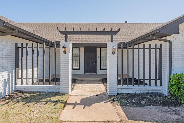 11800 Shasta Ln, Oklahoma City, OK 73162 - entrance to property with a shingled roof and brick siding