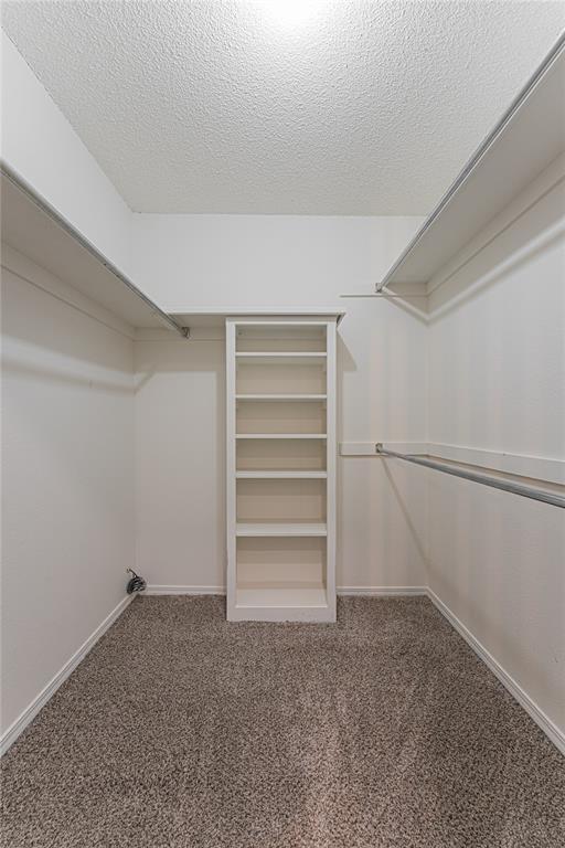 11800 Shasta Ln, Oklahoma City, OK 73162 - spacious closet with carpet