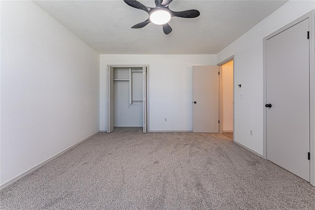 11800 Shasta Ln, Oklahoma City, OK 73162 - unfurnished bedroom with light carpet, a closet, ceiling fan, and a textured ceiling