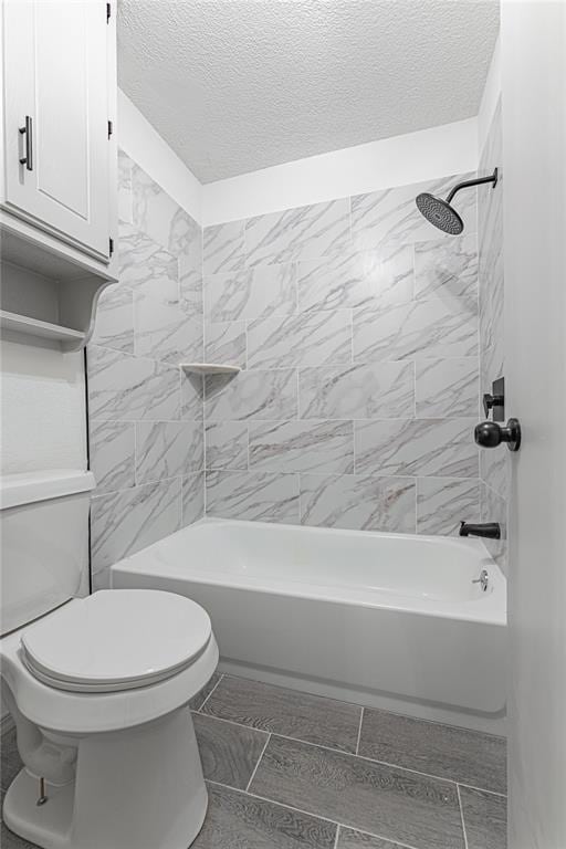 11800 Shasta Ln, Oklahoma City, OK 73162 - bathroom featuring toilet, a textured ceiling, and  shower combination
