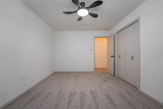 11800 Shasta Ln, Oklahoma City, OK 73162 - unfurnished bedroom with a closet, baseboards, a ceiling fan, and carpet