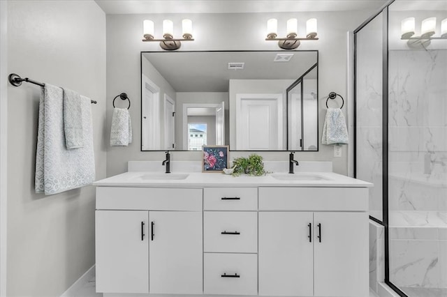 508 NW 175th St, Edmond, OK 73012 - full bathroom featuring a marble finish shower and double vanity