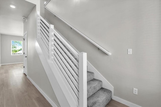 508 NW 175th St, Edmond, OK 73012 - stairway featuring wood finished floors, baseboards, and recessed lighting