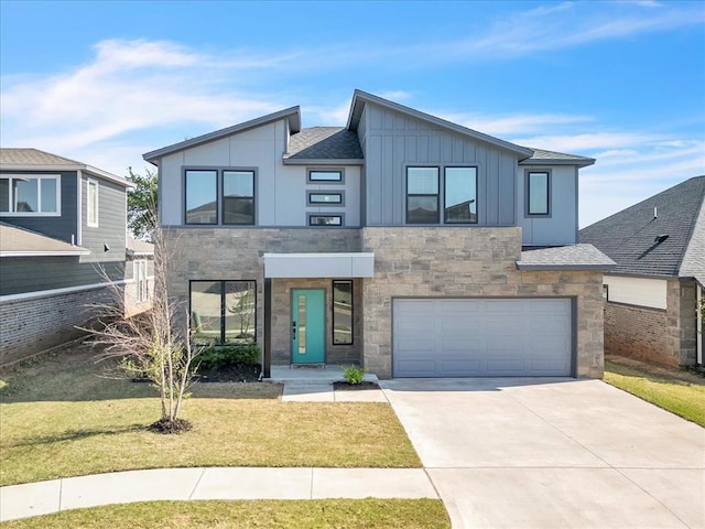 508 NW 175th St, Edmond, OK 73012 - contemporary house featuring board and batten siding, an attached garage, driveway, stone siding, and a front yard