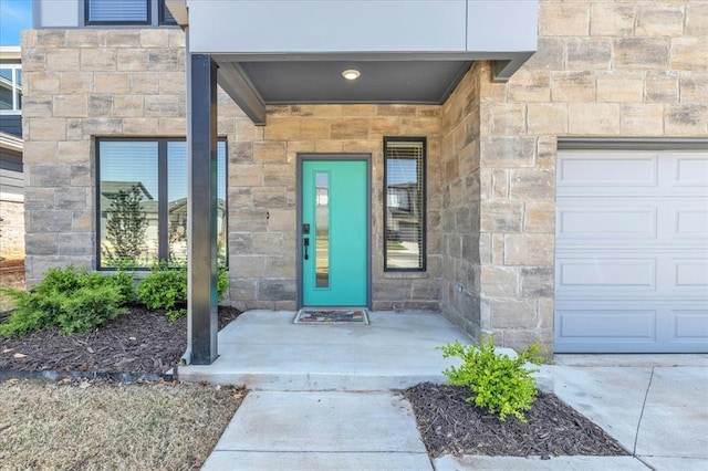 508 NW 175th St, Edmond, OK 73012 - entrance to property with stone siding and an attached garage