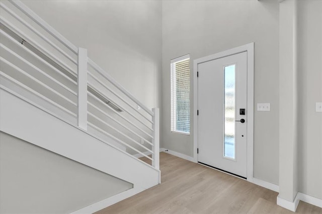 508 NW 175th St, Edmond, OK 73012 - foyer with stairway, light wood-style floors, and baseboards