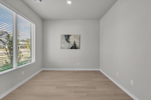 508 NW 175th St, Edmond, OK 73012 - spare room with plenty of natural light, light wood-type flooring, baseboards, and recessed lighting