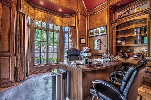 5100 Wisteria Dr, Oklahoma City, OK 73142 - office with wood walls, wood-type flooring, and a healthy amount of sunlight