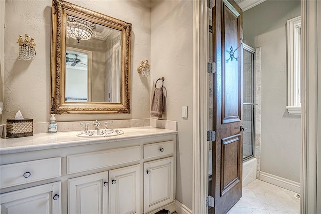 5100 Wisteria Dr, Oklahoma City, OK 73142 - bathroom with marble finish floor, combined bath / shower with glass door, vanity, and ornamental molding