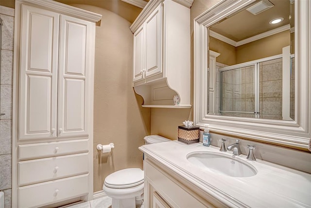 5100 Wisteria Dr, Oklahoma City, OK 73142 - full bath with vanity, ornamental molding, toilet, tiled shower, and visible vents