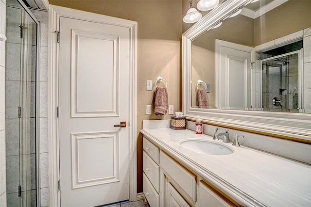 5100 Wisteria Dr, Oklahoma City, OK 73142 - bathroom with a shower stall, vanity, and crown molding
