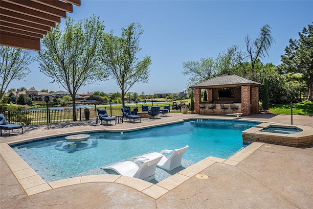5100 Wisteria Dr, Oklahoma City, OK 73142 - view of pool with a patio area, a gazebo, fence, outdoor dry bar, and an in ground hot tub