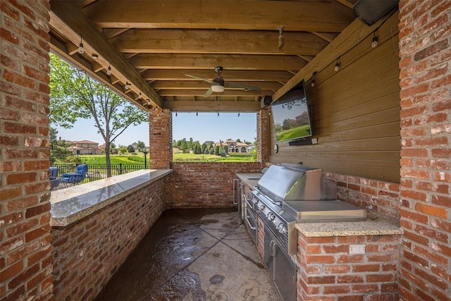 5100 Wisteria Dr, Oklahoma City, OK 73142 - view of patio with a ceiling fan, fence, a residential view, and an outdoor kitchen