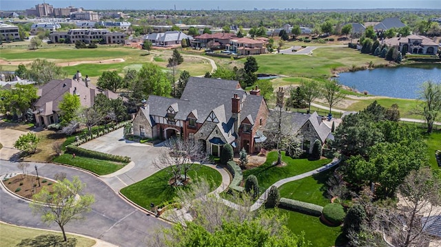 5100 Wisteria Dr, Oklahoma City, OK 73142 - bird's eye view featuring a water view, a residential view, and view of golf course