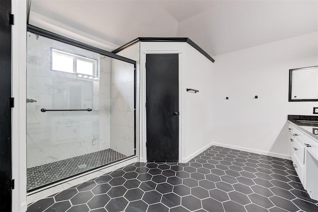full bathroom with tile patterned floors, a shower stall, and vanity