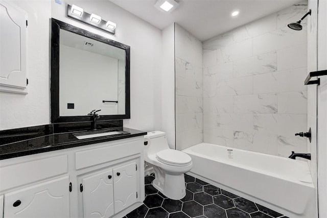 full bathroom with visible vents, toilet, vanity,  shower combination, and tile patterned flooring