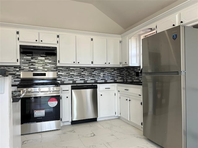 kitchen featuring dark countertops, marble finish floor, stainless steel appliances, and under cabinet range hood