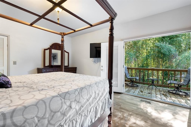 bedroom with wood finished floors