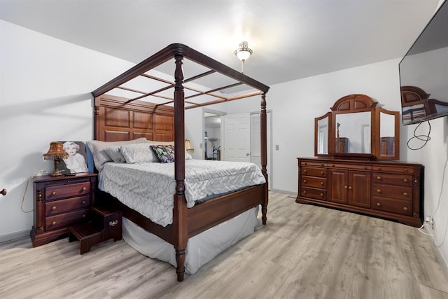 bedroom with wood finished floors