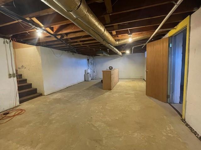 401 Memorial Dr, Okarche, OK 73762 - unfinished basement with stairs