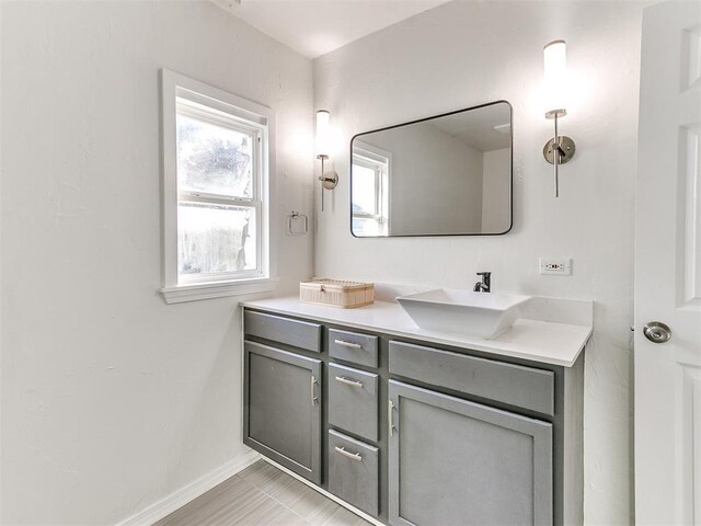 1804 Guilford Ln, Nichols Hills, OK 73120 - bathroom with baseboards and vanity