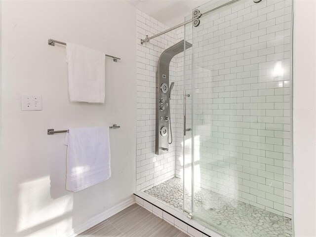 1804 Guilford Ln, Nichols Hills, OK 73120 - bathroom featuring baseboards and a stall shower